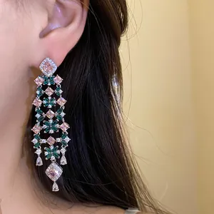 Detailed macro view of elegant zircon flower tassel earrings with premium 18k gold plating