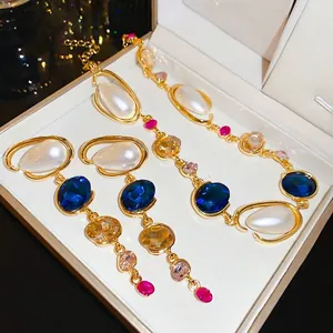 Elegant geometric jewelry set with teardrop pearls and colorful inlaid crystals set