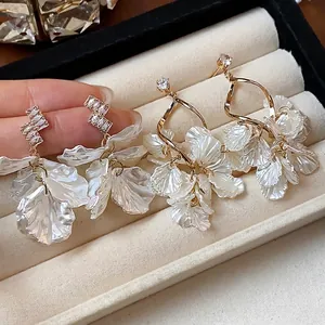 Elegant silver needle earrings with zircon and white petal shells for women