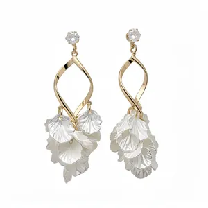 Elegant gold and silver zircon drop earrings with delicate white petal shell tassels