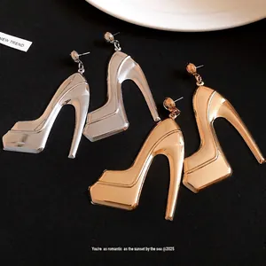 Trendy polished metal high-heel pump dangle earrings in gold and silver finish