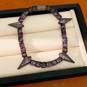 Elegant punk style purple zircon bracelet featuring round stones and four spike charms