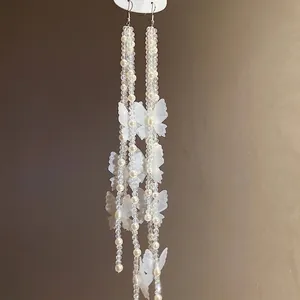 Elegant pearl beaded earrings with chiffon butterflies and long tassels for women