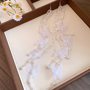 Elegant long tassel earrings with pearls and delicate white chiffon butterflies