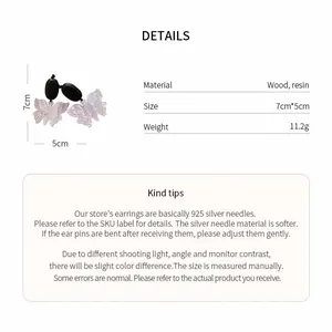 Dimensions détaillées et spécifications des boucles d'oreilles papillon en bois