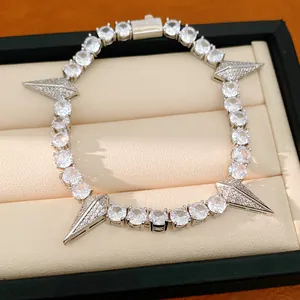Detailed close-up of a hip-hop punk style zircon bracelet with triangular spikes