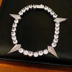Close-up of hip-hop style zircon bracelet with pointed diamond charms