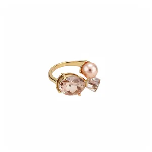 Elegant gold open ring with pink faux pearl and faceted oval crystals for women