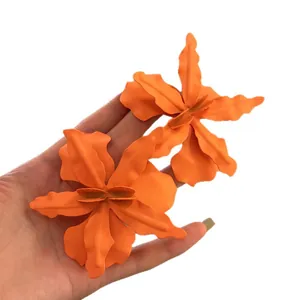 Exaggerated large orange orchid flower stud earrings for beach vacation and summer party style