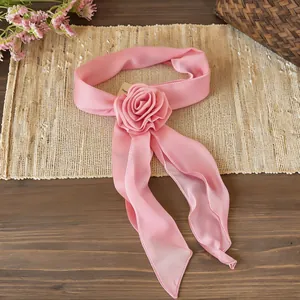 Elegant pink chiffon ribbon necklace featuring a delicate fabric rose flower design