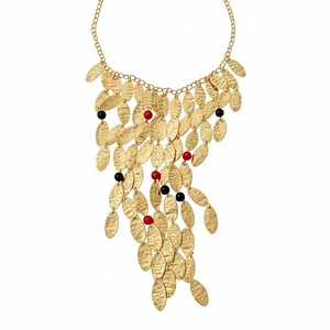 Vintage gold layered necklace with crumpled leaf tassels and red black agate beads