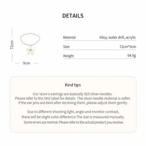 Detailed view of the white flower pendant necklace with alloy and acrylic materials.