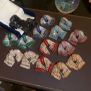 Multi-color rhinestone zircon bow earrings showing sparkling details and color variety