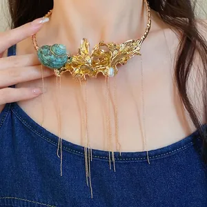 Vintage palace style gold choker necklace with flower and turquoise conch shell design