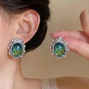 Elegant vintage palace style oval resin stud earrings with rhinestones for a classic look