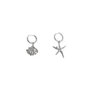 Elegant asymmetric silver hoop earrings with starfish seashell charms and tiny pearls