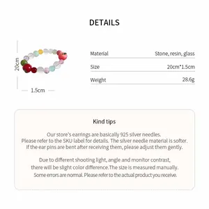 Detail view of a colorful stone and resin beaded apple charm bracelet with specifications