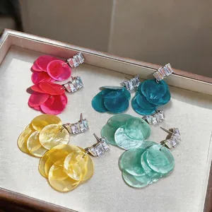 Elegant silver needle shell earrings with geometric zirconia for women, vacation style.