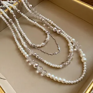 French vintage style pearl and cross bead necklace set with four pieces for women