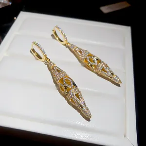 Exquisite 18K gold plated earrings with sparkling CZ pavé and hollow diamond design