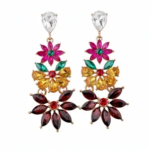 Vintage floral drop earrings with multicolored rhinestones and gold-tone finish.