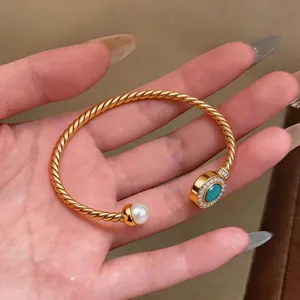 18K gold plated twisted cuff bracelet with pearl and turquoise gemstone details