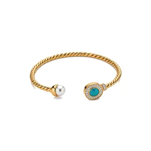 Elegant 18K gold plated twisted cable cuff bracelet with white pearl and turquoise stone