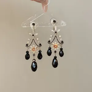 Vintage ethnic style silver dangle earrings with black faceted beads and crystals