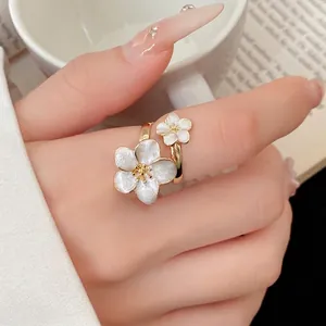 Elegant white enamel flower open ring in vintage gold finish for women