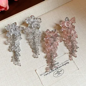 Elegant glass bead flower tassel stud earrings with silver needles for women.