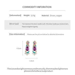 Detailed view of vintage zircon drop earrings with measurements and material info