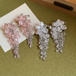 Elegant floral tassel earrings featuring faceted glass beads and silver needles for women