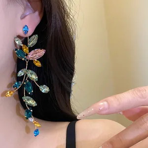 Detailed view of colorful marquise crystal tassel earrings with silver needle