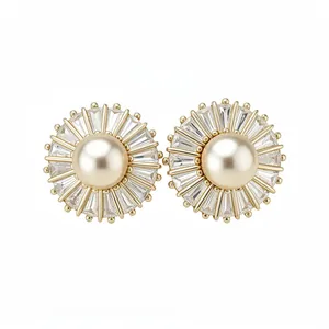 Elegant vintage gold-plated stud earrings featuring sunburst zircon halo and center pearl
