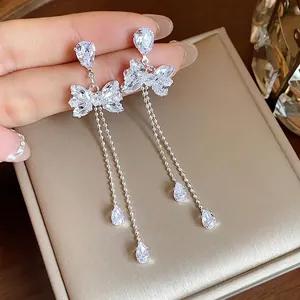 Elegant sparkly cubic zirconia butterfly tassel earrings with silver needles for women