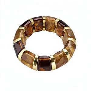 Bracelet élastique imposant en résine écaille de tortue avec détails dorés
