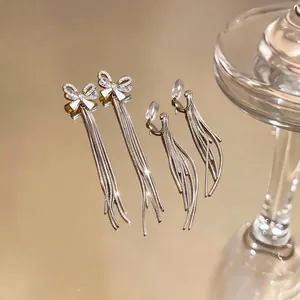 Silver needle zircon bow tassel earrings and fashionable delicate ear cuffs for women