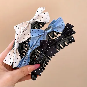 Elegant polka dot bow banana hair clips set in white, blue and black for women