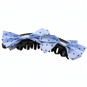Elegant Korean style banana hair clip featuring light blue polka dot bows for women