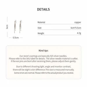 Macro detail view of elegant tassel bow earrings with copper material specs.