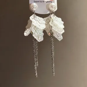 Elegant silver needle pearl petal tassel earrings with a beautiful iridescent finish