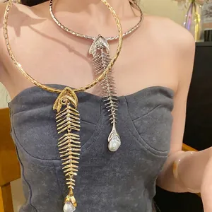 Vintage oversized fishbone pendant choker with pearls for a bold retro style