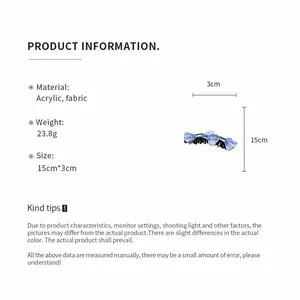 Detail view showing dimensions and materials of the blue polka dot bow hair clip.