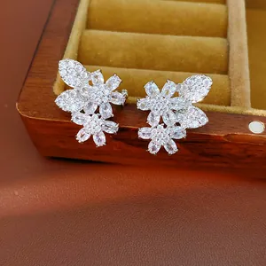 Macro view of zircon floral butterfly ear clips for non-pierced ears
