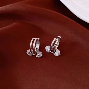 Luxury 18K gold plated oval hollow hoop earrings featuring sparkling clear zircon stones