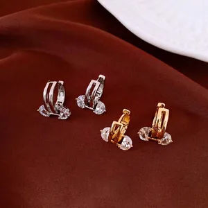 Elegant 18K gold plated oval hollow hoop earrings with sparkling zircons set in metal