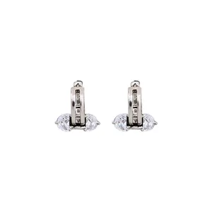 Elegant 18K real gold plated huggie earrings featuring cubic zirconia stones and a hollow design
