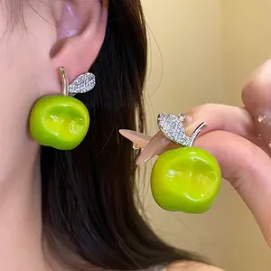 Fresh green resin apple stud earrings with sparkling zirconia leaf accents for women.