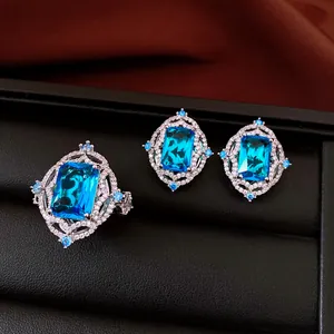 Luxury vintage blue zircon jewelry set featuring a rectangular ring and matching earrings