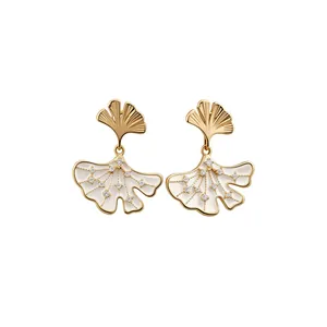 Elegant 14k gold plated ginkgo leaf stud earrings with shimmering white zircon accents